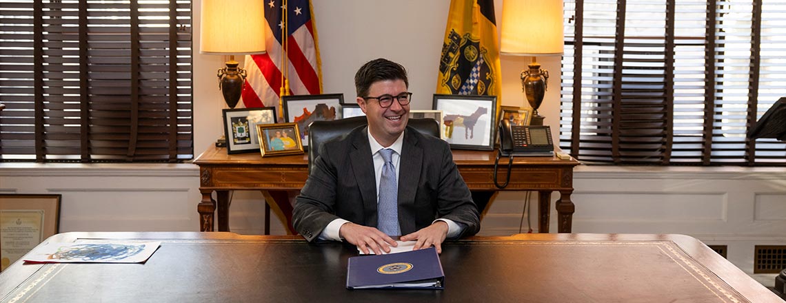 Mayor O'Connor sitting at Mayor's Desk