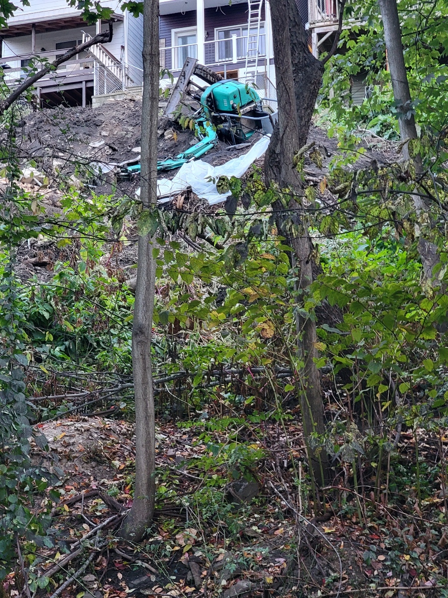 backhoe toppled over
