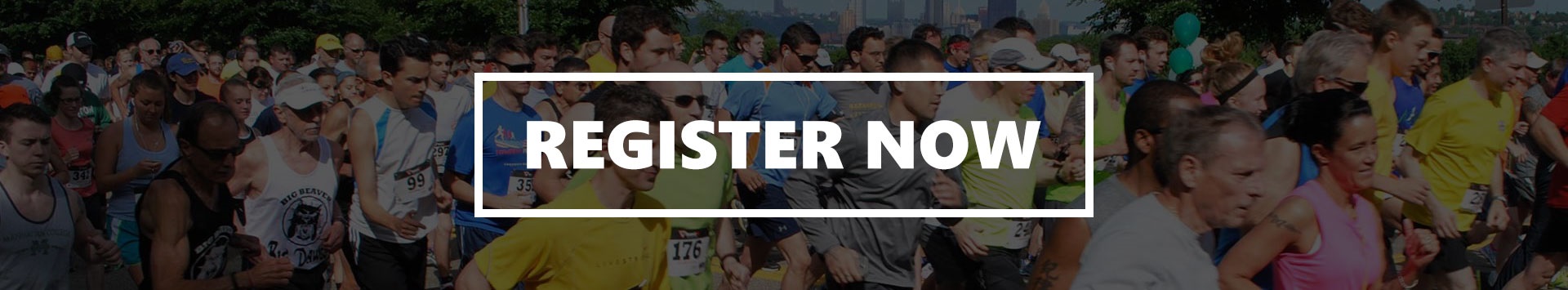 Background image of runner - graphic is a registration link for the Greenfield Glide 5K.