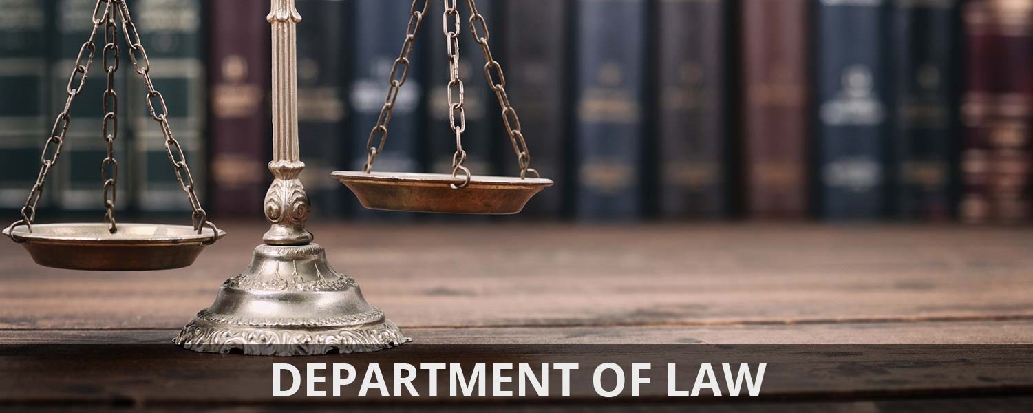 Department of Law - image of scale with law books in the background.